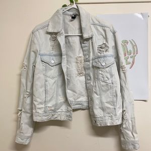 Women’s ripped denim jacket